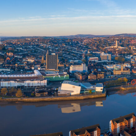 An aerial view at sunrise of Newport city centre, south wales United Kingdom, taken from the River Usk