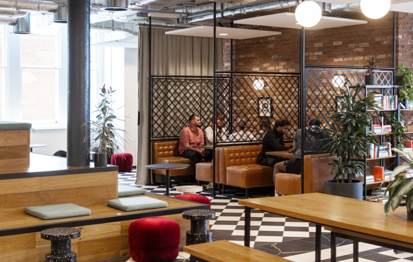 A hospitality-style reception and coffee lounge create a warm welcome.